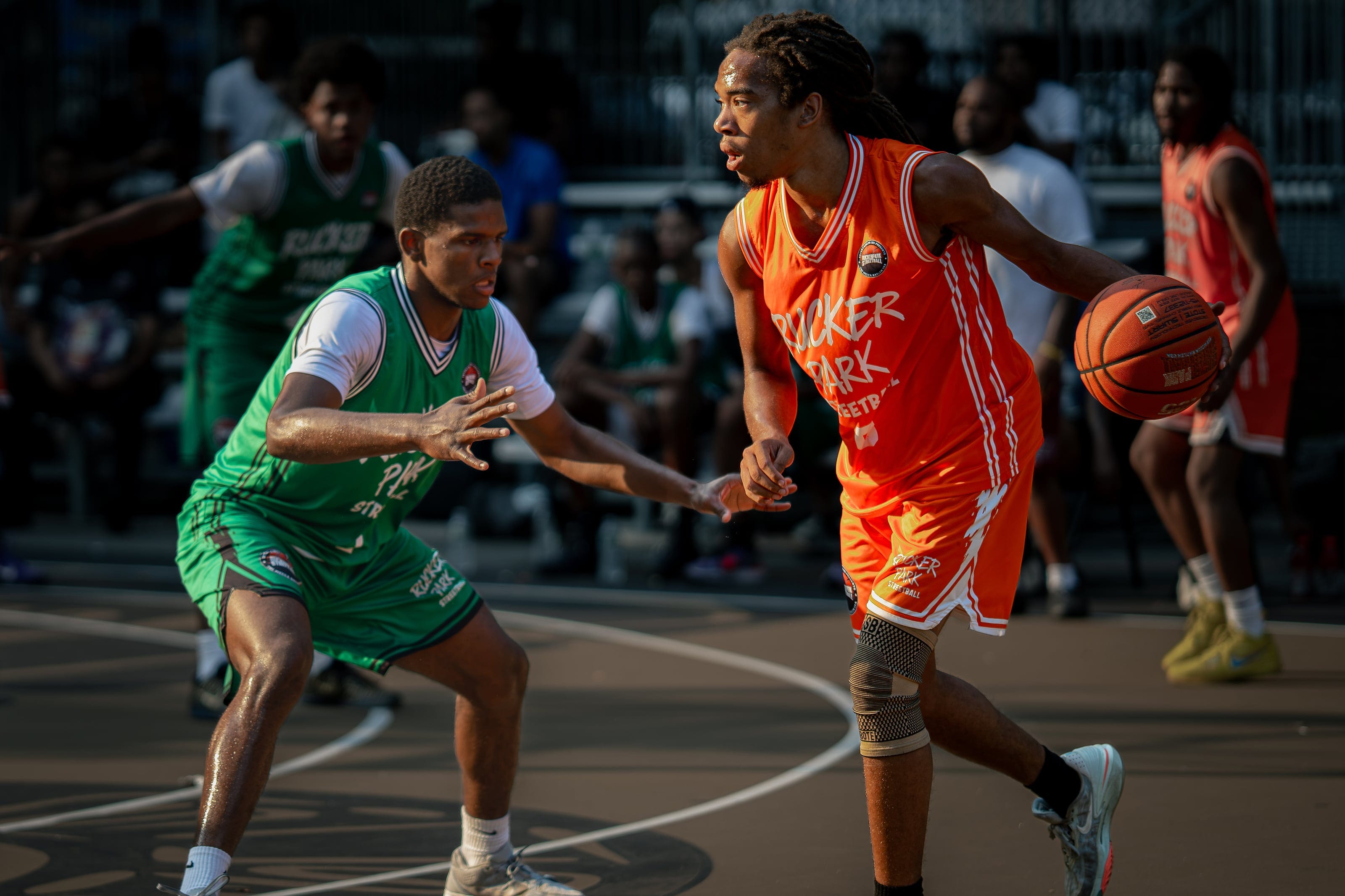 Sizing up the defender at the top of the key