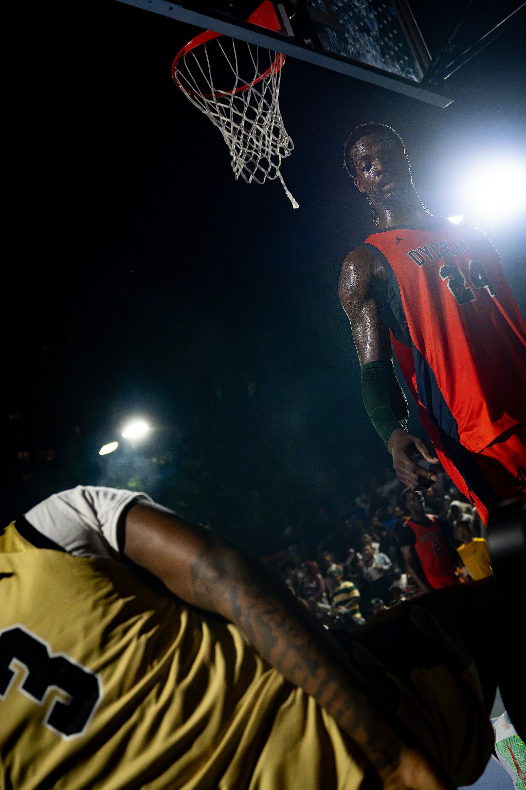 Standing over him after the play, the rim still swinging