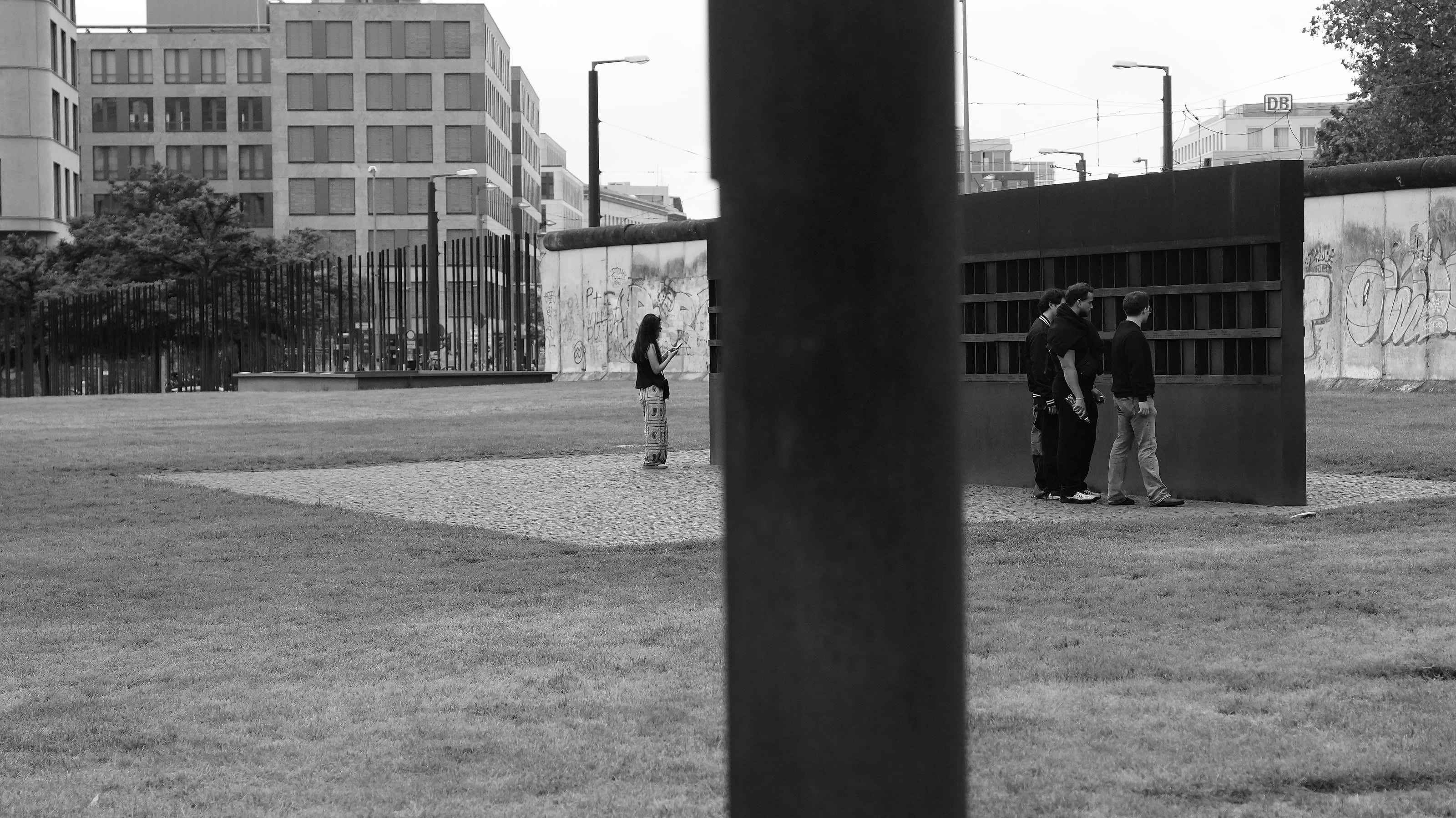 The Berlin Wall memorial, a lone figure between the segments