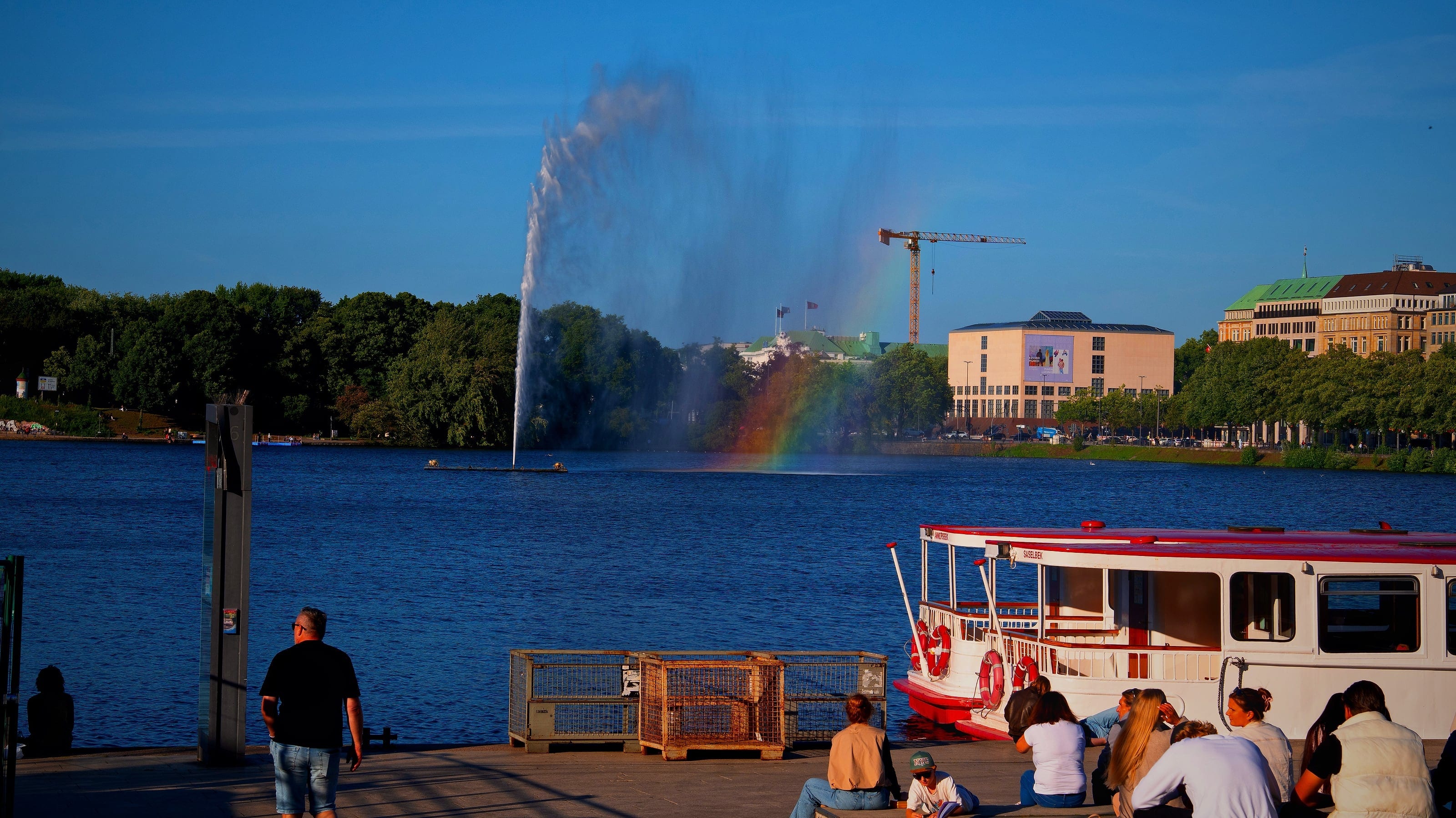 Water spraying with rainbow forming